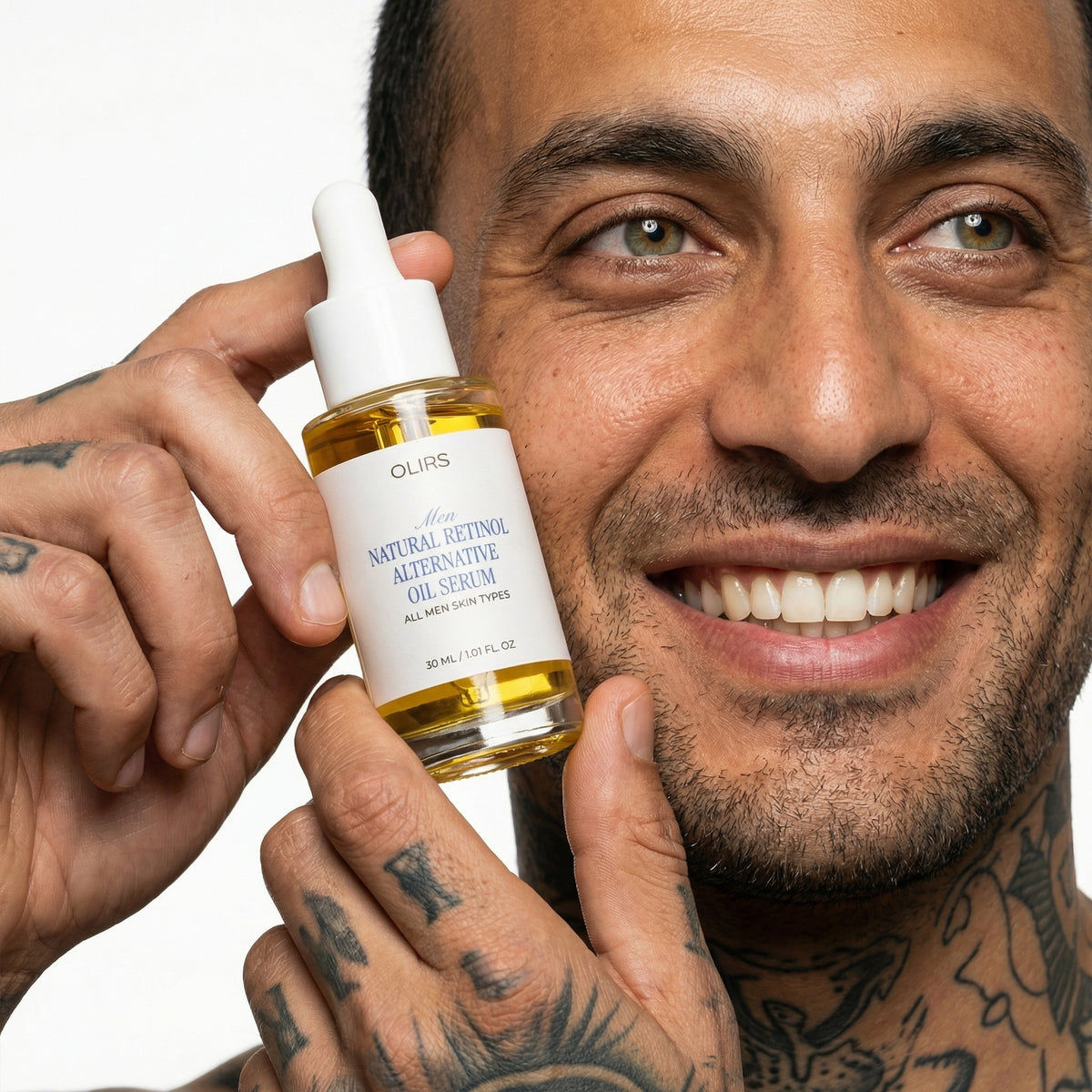 Man holding OLIRS Natural Retinol Alternative Oil Serum for all men skin types.
